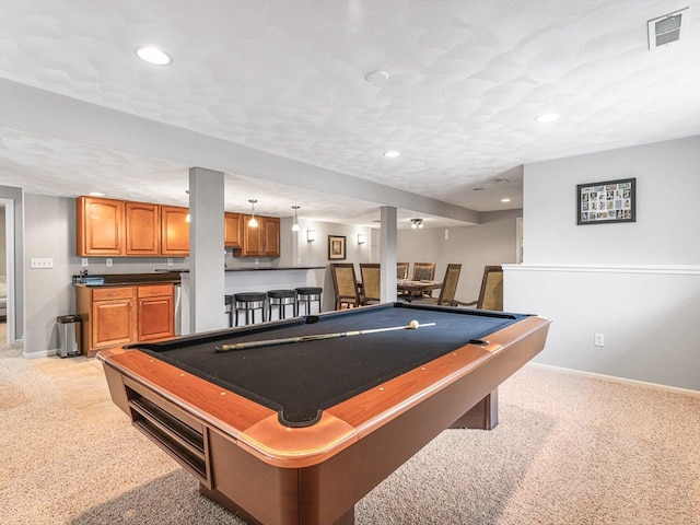 11546 Ridgecrest Dr, Roscoe, IL 61073 - rec room with billiards table, bar, recessed lighting, and light colored carpet
