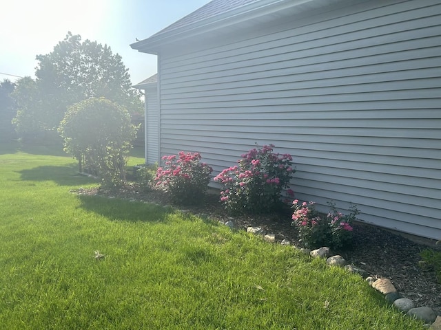 11546 Ridgecrest Dr, Roscoe, IL 61073 - view of property exterior with a lawn