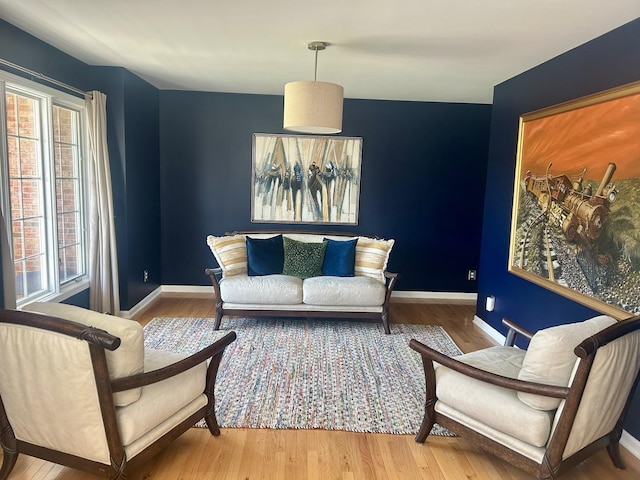 11546 Ridgecrest Dr, Roscoe, IL 61073 - living area featuring plenty of natural light and wood finished floors