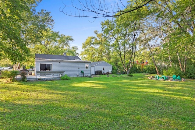 9 Craig Ter, Lake Zurich, IL 60047 - view of grassy yard with a wooden deck