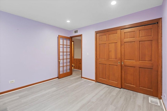 9 Craig Ter, Lake Zurich, IL 60047 - unfurnished bedroom featuring light wood-type flooring, recessed lighting, and a closet