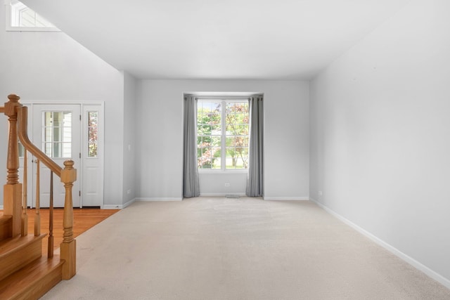 7N001 Ridge Line Rd, Saint Charles, IL 60175 - carpeted spare room featuring baseboards and stairs