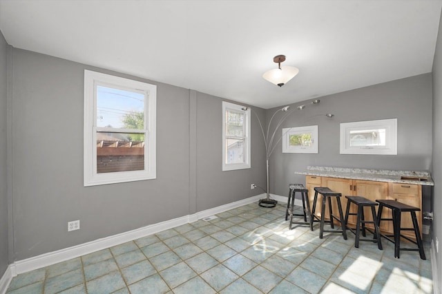 5151 W Fletcher St, Chicago, IL 60641 - dining room featuring baseboards
