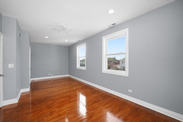 5151 W Fletcher St, Chicago, IL 60641 - unfurnished room featuring baseboards, wood finished floors, recessed lighting, and a ceiling fan