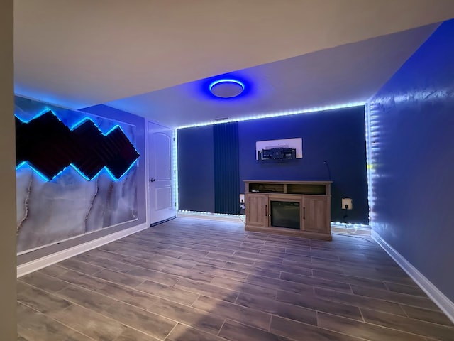 5151 W Fletcher St, Chicago, IL 60641 - cinema featuring wood finished floors, baseboards, and a fireplace