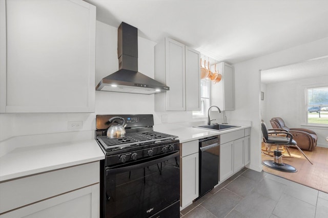 345 W Joe Orr Rd, Chicago Heights, IL 60411 - kitchen with black appliances, wall chimney exhaust hood, light countertops, and tile patterned floors