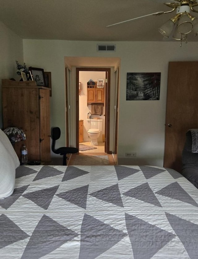14015 James Dr Unit 523, Crestwood, IL 60418 - unfurnished bedroom featuring connected bathroom and a ceiling fan