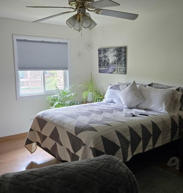 14015 James Dr Unit 523, Crestwood, IL 60418 - bedroom with a ceiling fan and wood finished floors