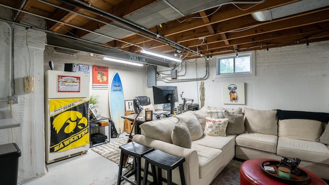 55 S Elmwood Ave, Palatine, IL 60074 - living area featuring concrete flooring and electric panel