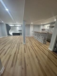 9536 S Woodlawn Ave, Chicago, IL 60628 - unfurnished living room featuring wood finished floors