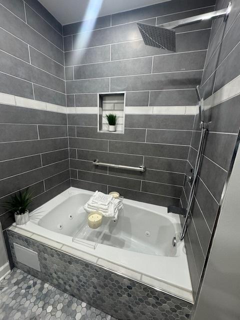 9536 S Woodlawn Ave, Chicago, IL 60628 - bathroom with tile patterned flooring and a combined bath / shower with jetted tub