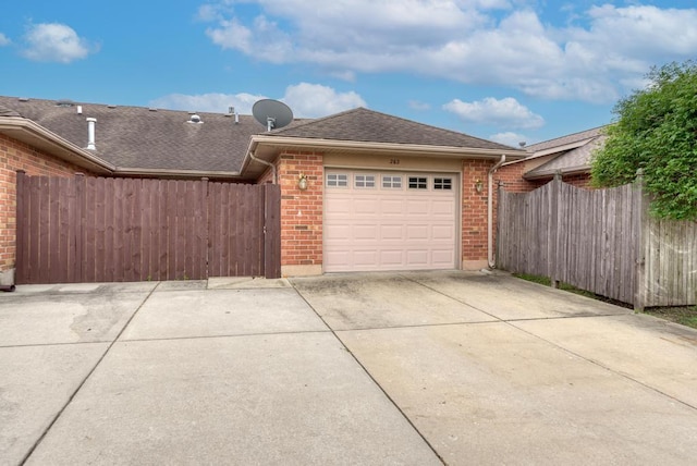 262 Jennifer Ln Unit 262, Wilmington, IL 60481 - garage featuring driveway