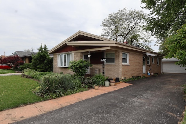 4525 W 125th St, Alsip, IL 60803 - view of front of property featuring brick siding, a chimney, and a front yard
