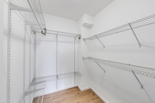 6325 N Sheridan Rd Unit 608, Chicago, IL 60660 - walk in closet featuring wood finished floors