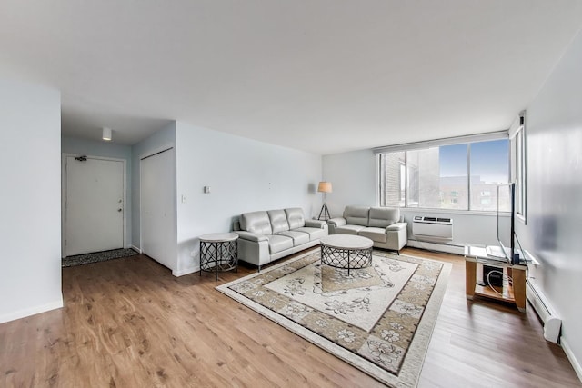 6325 N Sheridan Rd Unit 608, Chicago, IL 60660 - living area with a baseboard radiator, wood finished floors, and baseboards