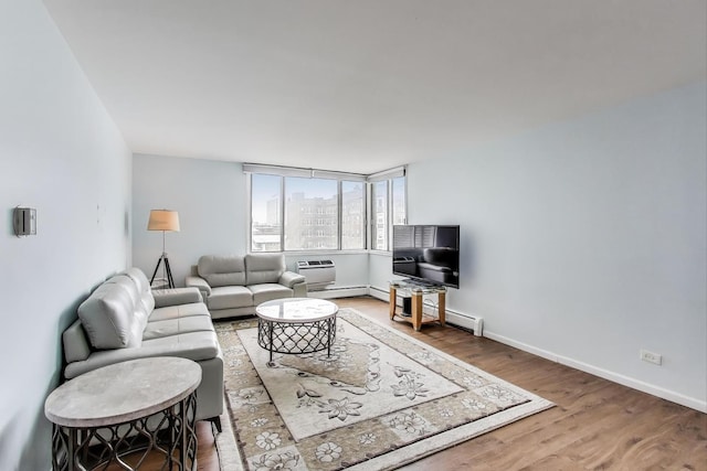 6325 N Sheridan Rd Unit 608, Chicago, IL 60660 - living area featuring wood finished floors, baseboards, and a baseboard heating unit