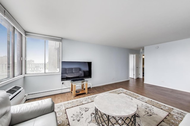 6325 N Sheridan Rd Unit 608, Chicago, IL 60660 - living area featuring wood finished floors, baseboard heating, and baseboards