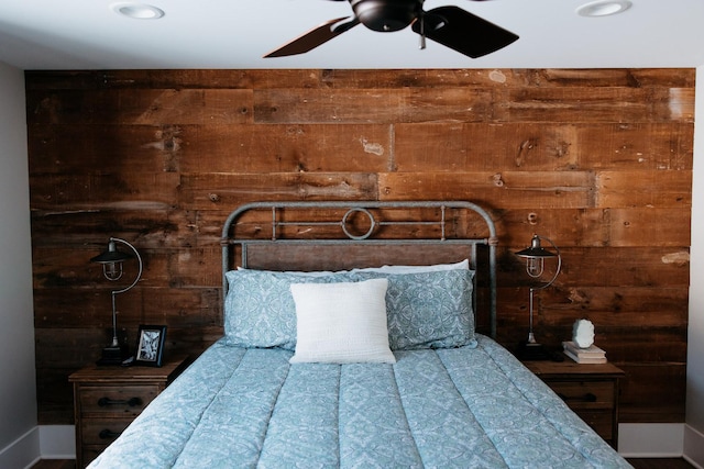 281 Snipe Hollow Rd N, Elizabeth, IL 61028 - bedroom with wood walls, recessed lighting, and baseboards