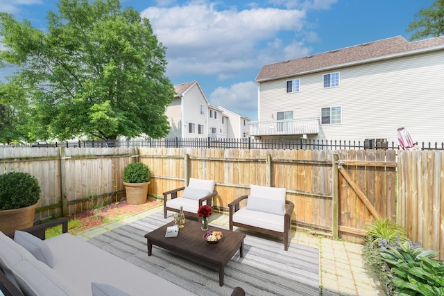 7 Fernwood Dr Unit Q, Bolingbrook, IL 60440 - wooden terrace with an outdoor hangout area, a patio, and a residential view