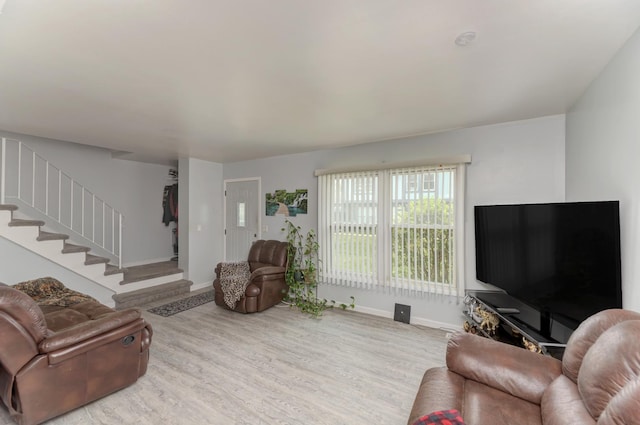 7 Fernwood Dr Unit Q, Bolingbrook, IL 60440 - living area featuring baseboards, wood finished floors, and stairs