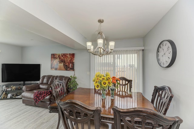 7 Fernwood Dr Unit Q, Bolingbrook, IL 60440 - dining area with a chandelier and wood finished floors