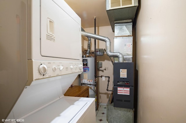 1036 Colony Lake Dr Unit 0, Schaumburg, IL 60194 - laundry room with stacked washing machine and dryer and gas water heater