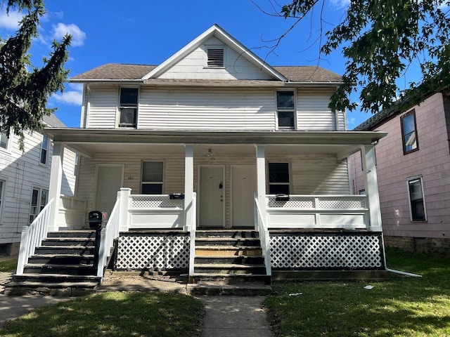 360 S Washington Ave, Kankakee, IL 60901 - view of front of house with covered porch and roof with shingles