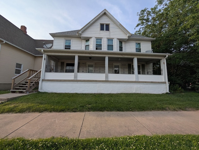 363 E Hickory St, Kankakee, IL 60901 - view of front of property featuring a front lawn