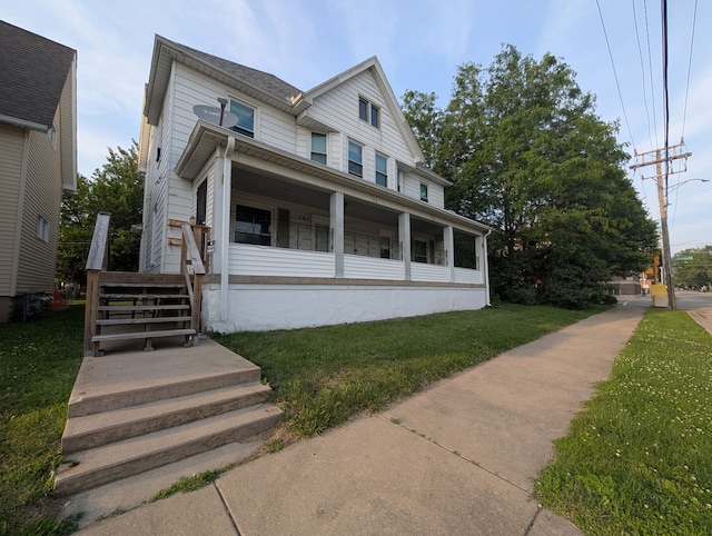 363 E Hickory St, Kankakee, IL 60901 - view of front of house featuring a front lawn
