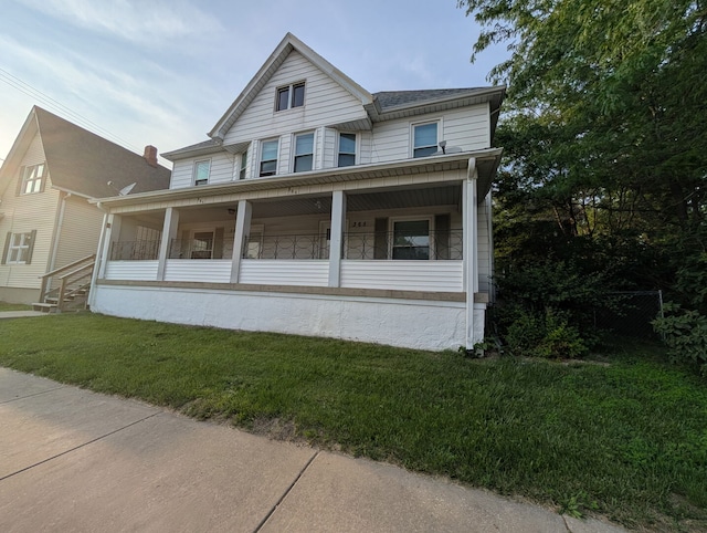 363 E Hickory St, Kankakee, IL 60901 - view of front of property with a front lawn