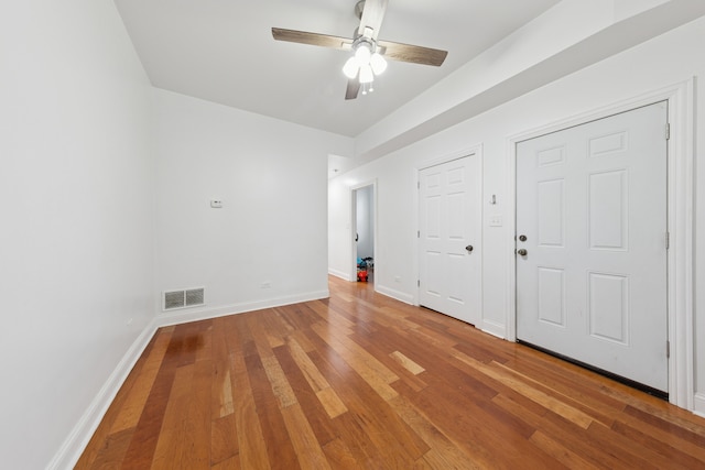1332 S Keeler Ave, Chicago, IL 60623 - spare room with ceiling fan, light wood-style floors, and baseboards