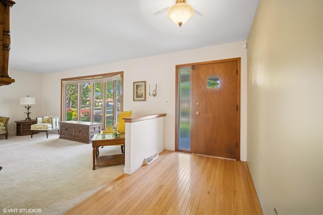 1713 N Laurel Dr, Mount Prospect, IL 60056 - entrance foyer with wood-type flooring and baseboards