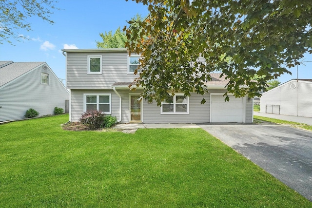 163 Queenswood Rd, Bolingbrook, IL 60440 - view of front of house featuring asphalt driveway, a front yard, and an attached garage