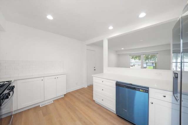 163 Queenswood Rd, Bolingbrook, IL 60440 - kitchen with dishwasher, gas stove, light wood-type flooring, white cabinetry, and backsplash