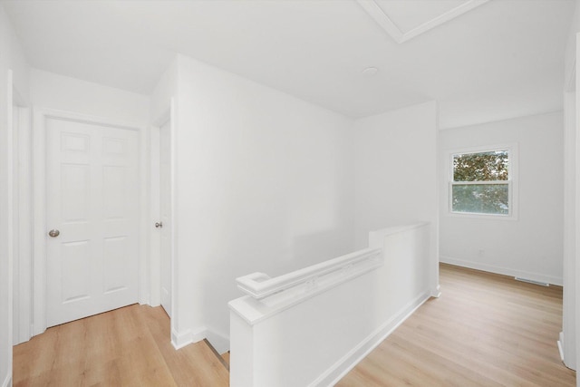 163 Queenswood Rd, Bolingbrook, IL 60440 - corridor featuring an upstairs landing, light wood-style flooring, and baseboards