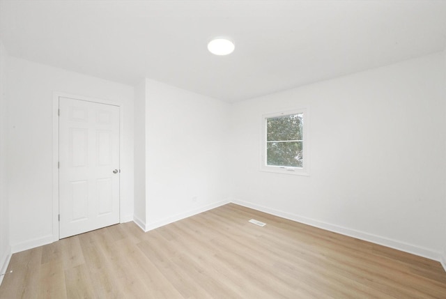 163 Queenswood Rd, Bolingbrook, IL 60440 - spare room featuring light wood finished floors and baseboards