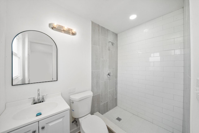 163 Queenswood Rd, Bolingbrook, IL 60440 - bathroom with toilet, vanity, tiled shower, and recessed lighting