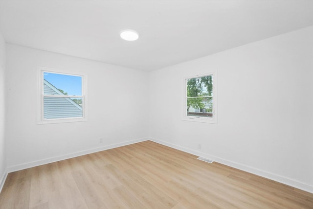 163 Queenswood Rd, Bolingbrook, IL 60440 - spare room with light wood-style flooring and baseboards