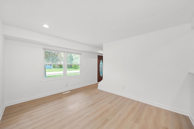 163 Queenswood Rd, Bolingbrook, IL 60440 - spare room featuring light wood-style floors, baseboards, and recessed lighting