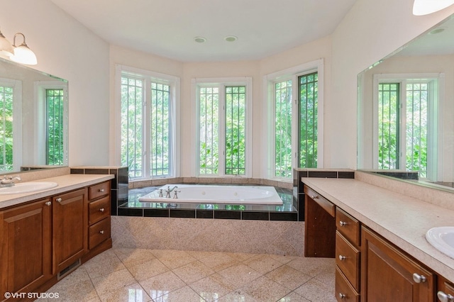 4722 Douglas Rd, Oswego, IL 60543 - bathroom featuring two vanities and a bath