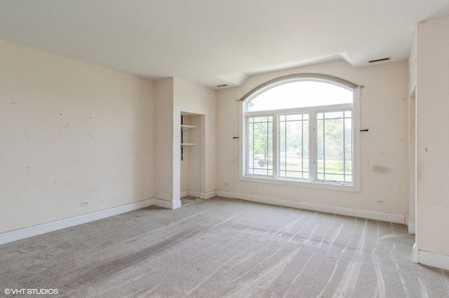 4722 Douglas Rd, Oswego, IL 60543 - spare room with light colored carpet and baseboards