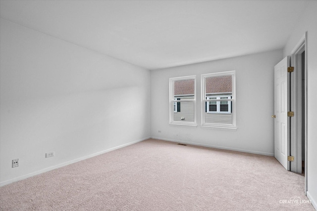 1096 Village Center Pkwy Unit 6, Aurora, IL 60506 - spare room with light carpet and baseboards