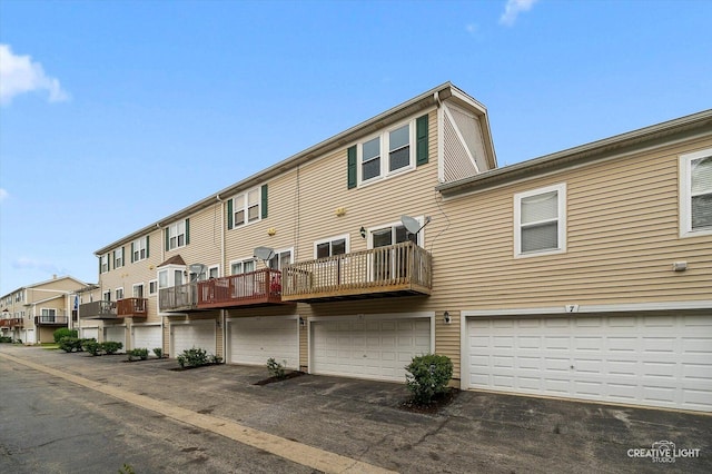 1096 Village Center Pkwy Unit 6, Aurora, IL 60506 - rear view of property with a residential view, an attached garage, and driveway