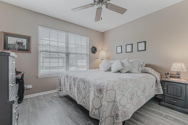 303 Capitol Dr Unit A, Sugar Grove, IL 60554 - bedroom featuring wood tiled floors, baseboards, and ceiling fan