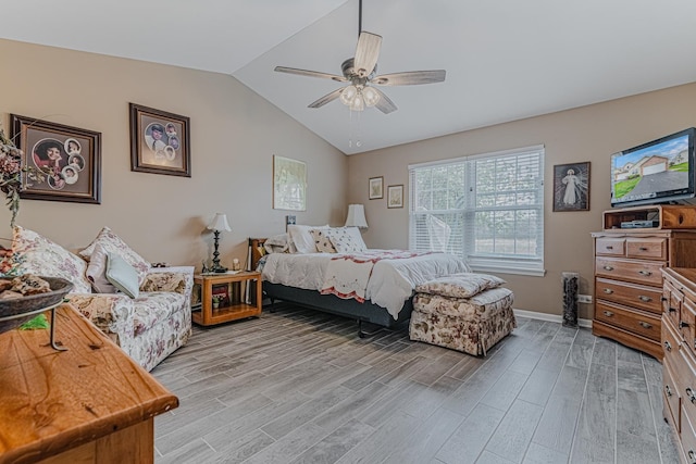 303 Capitol Dr Unit A, Sugar Grove, IL 60554 - bedroom with light wood-style floors, lofted ceiling, baseboards, and ceiling fan