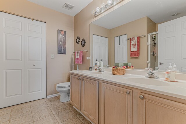 303 Capitol Dr Unit A, Sugar Grove, IL 60554 - full bath featuring toilet, double vanity, and an enclosed shower