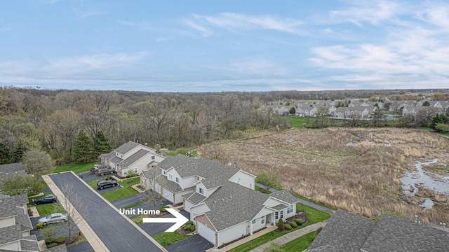 303 Capitol Dr Unit A, Sugar Grove, IL 60554 - aerial view of residential area featuring a forest