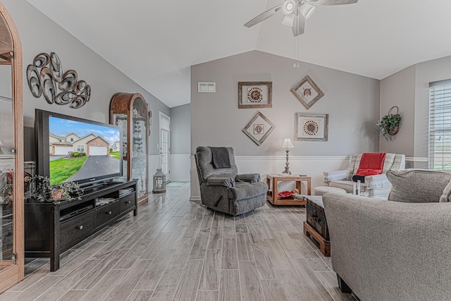 303 Capitol Dr Unit A, Sugar Grove, IL 60554 - living room with ceiling fan, vaulted ceiling, and light wood finished floors