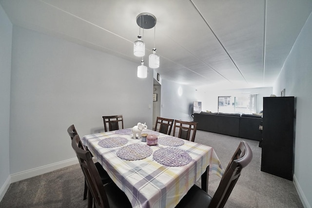 603 S River Rd Unit 2K, Des Plaines, IL 60016 - carpeted dining space with baseboards