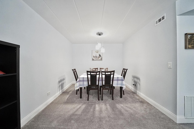 603 S River Rd Unit 2K, Des Plaines, IL 60016 - dining space featuring carpet floors and baseboards